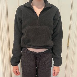 Grey cropped quarter zip fleece. Aritzia